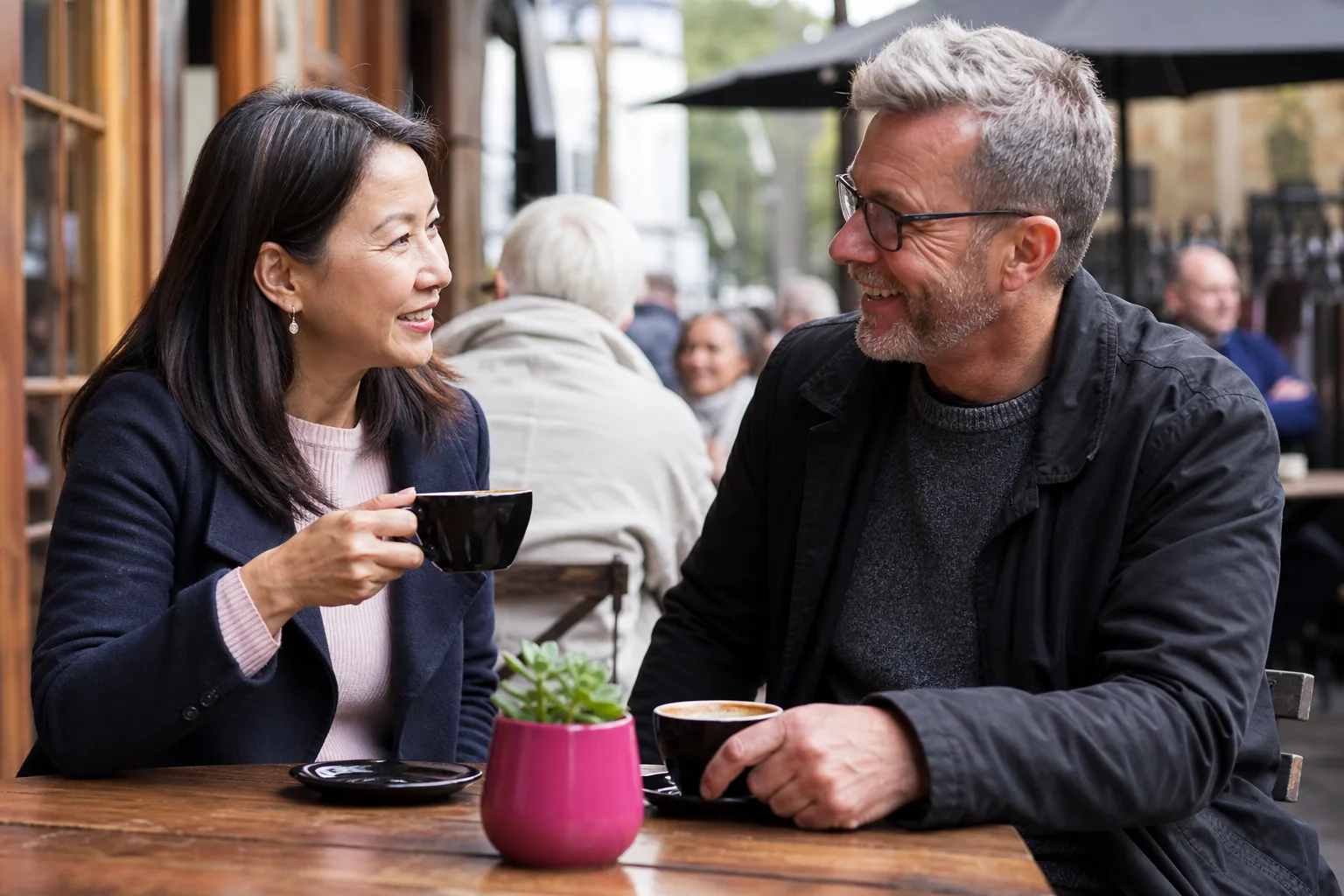 Mature couple talking over coffee in Ipswich